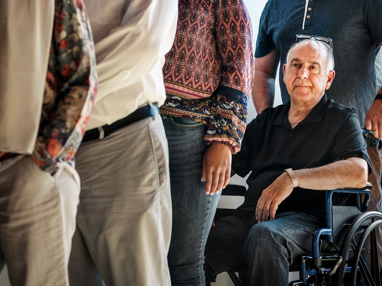 wheelchair disabled man waiting in line