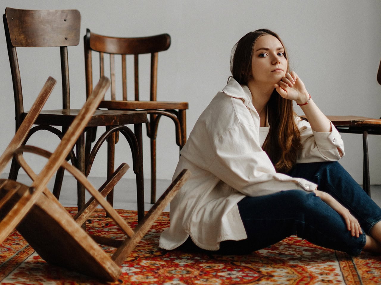 woman sitting on the floor