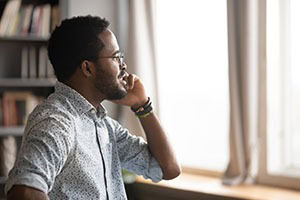 Picture of a man talking on a phone