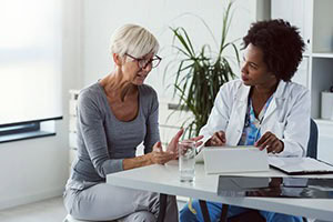 Picture of a woman speaking to her doctor