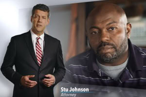 Attorney Stu Johnson in a frame of a TV commercial