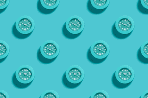 blue clocks on blue background