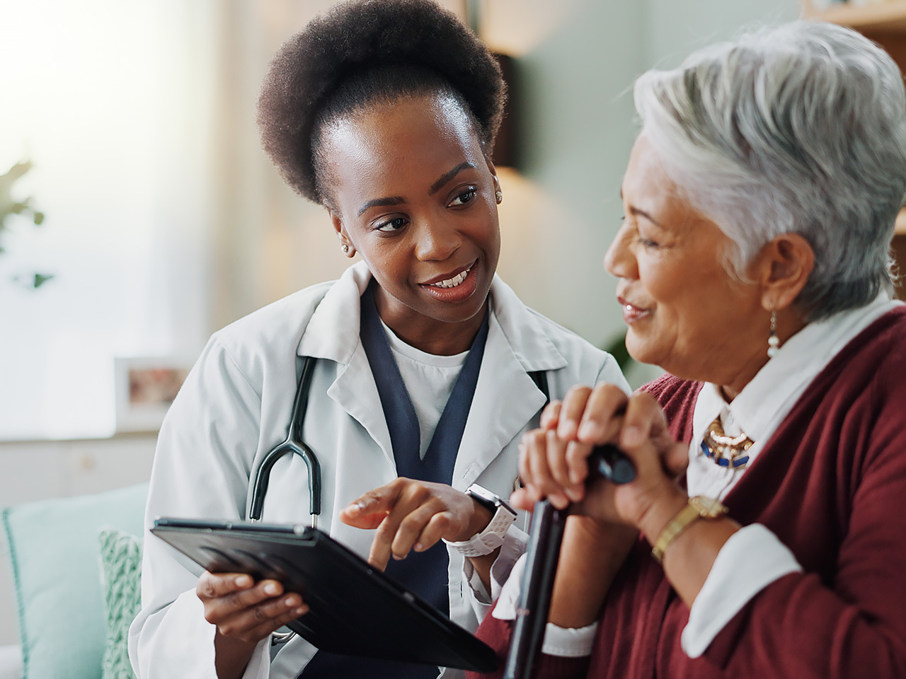 Young doctor with elderly woman