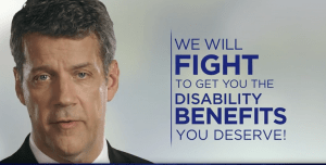 Still frame of Attorney Stu Johnson in TV commercial with graphic that reads "we will fight to help you get the disability benefits you deserve"