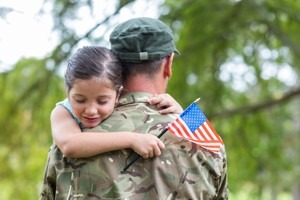 Young soldier reunited with his daughter